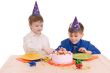 two boy wich cake