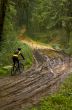 Biker crossing mud