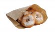 Fried donuts in a paper bag