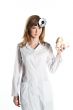 Female doctor with a human skull in his hands