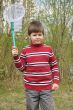 Boy with a butterfly net for catching butterflies