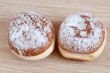 Donuts sprinkled with powdered sugar