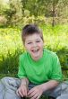 The boy in the park on a summer day
