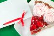 a piece of delicious cake and paper for text