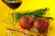 New Year`s still life - glasses of wine and Christmas balls