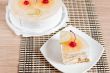 Fruit cake with cherries, pineapple and apple.