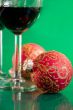 New Year`s still life - glasses of wine and Christmas balls