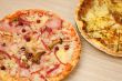 Appetizing pizza with mushrooms and ham