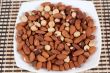 Roasted almonds and hazelnuts on a plate