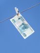 Russian money hanging on the clothesline. Money laundering 