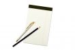 Notebook with pencil and pen