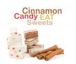 Sweets and cinnamon sticks isolated on white background