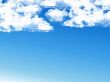 blue sky background with tiny clouds