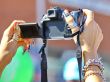  Camera in women`s hands
