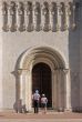 The woman and the girl at temple doors