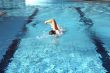 a man learn swim the crawl in pool