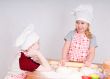 girl and boy  in chef`s hats