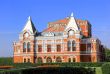 Landscape with historic theater and blue sky