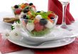 Salad of lettuce, cherry tomatoes, olives and mozzarella with pe