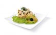 Salad with crab meat in a basket