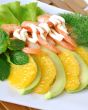 Appetizer of avocado and shrimp with orange