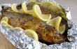 Baked herring in spices and herbs in foil