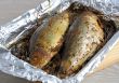 Herring in spices and herbs in foil