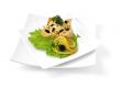 Salad with crab meat in a basket