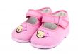a pair of baby pink shoes