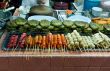 Asian street food tray with skewers