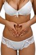 Woman forming heart shape on belly