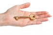 woman`s hand with a key,