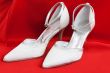 Pair of white women`s shoes