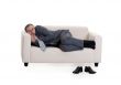 businessman sleeping on a sofa