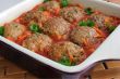 Meatballs with herbs and tomato sauce in the pan