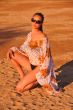 Young woman posing on beach 