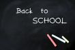 Back to school - text on a blackboard with chalk