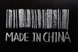 Bar code of `Made in China`written with chalk on a blackboard