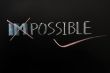 Conceptual image of the word impossible