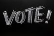Vote word written on a blackboard