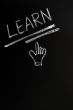 Learn written on a blackboard