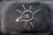 Light bulb drawn on a blackboard