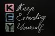 KEY acronym -Keep extending yourself on a blackboard with words written in chalk. 