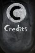 Credits sign on a blackboard