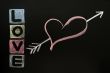Love drawn in chalk on a chalkboard 