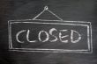 Closed - word written on blackboard