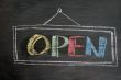 Open - word written on blackboard