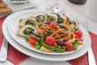 Chicken roulade with spinach and mushrooms with vegetables