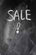 Sale written on blackboard