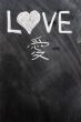 Love written on blackboard